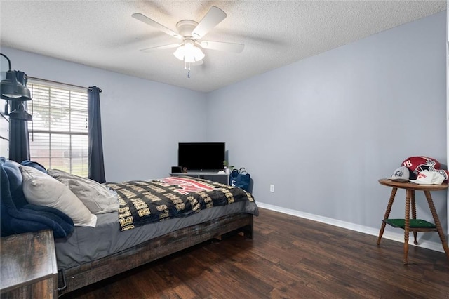 12601 Deer Ridge Dr, Wilmer, AL 36587 - bedroom featuring wood finished floors, a textured ceiling, and ceiling fan