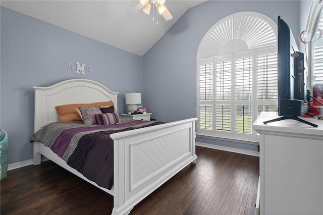 12601 Deer Ridge Dr, Wilmer, AL 36587 - bedroom with dark wood finished floors, vaulted ceiling, and ceiling fan