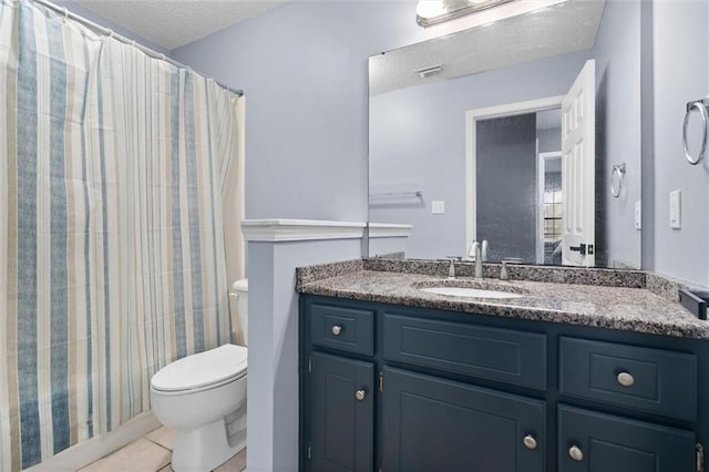 12601 Deer Ridge Dr, Wilmer, AL 36587 - full bath with a textured ceiling, vanity, tile patterned floors, and curtained shower