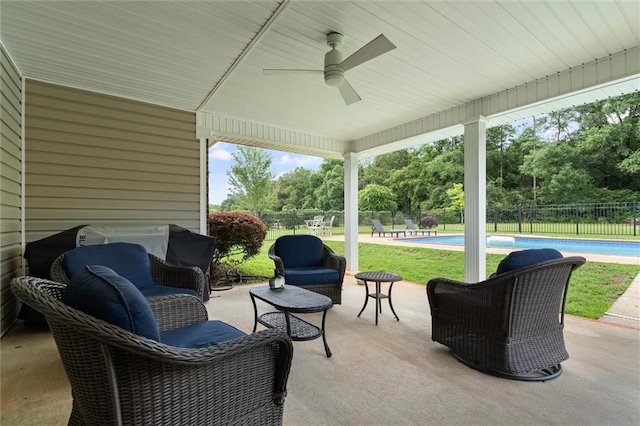 12601 Deer Ridge Dr, Wilmer, AL 36587 - fenced backyard featuring a ceiling fan, a patio area, and view of wooded area