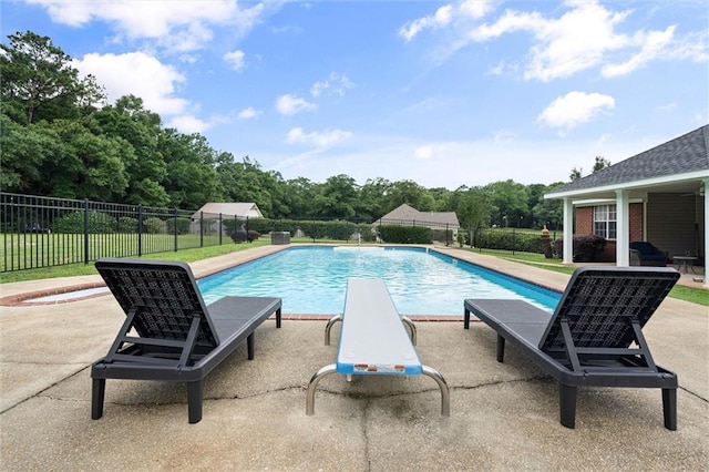 12601 Deer Ridge Dr, Wilmer, AL 36587 - view of swimming pool with a patio area and a diving board