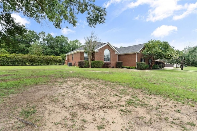 12601 Deer Ridge Dr, Wilmer, AL 36587 - view of front facade with brick siding and a front lawn