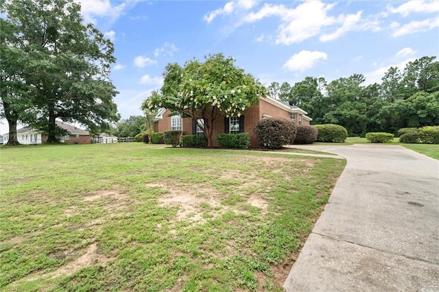 12601 Deer Ridge Dr, Wilmer, AL 36587 - view of property exterior with a yard