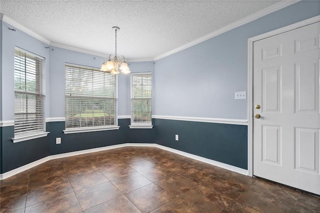 12601 Deer Ridge Dr, Wilmer, AL 36587 - empty room with a chandelier, plenty of natural light, a textured ceiling, and ornamental molding