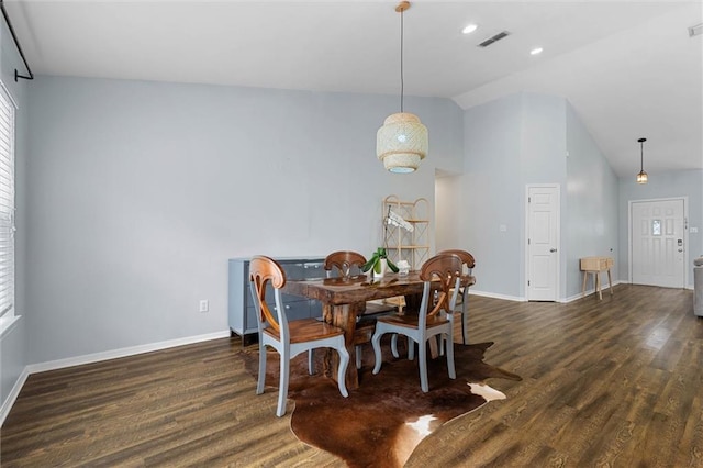dining area with wood finished floors, baseboards, high vaulted ceiling, and recessed lighting