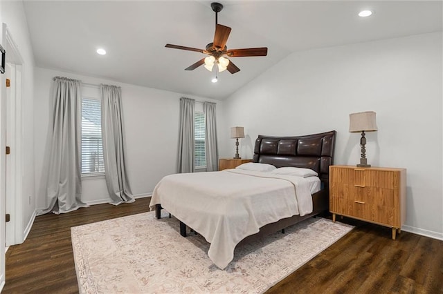 bedroom featuring dark wood-style flooring, multiple windows, vaulted ceiling, baseboards, and recessed lighting