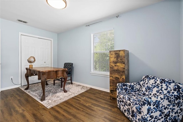 home office with dark wood finished floors and baseboards