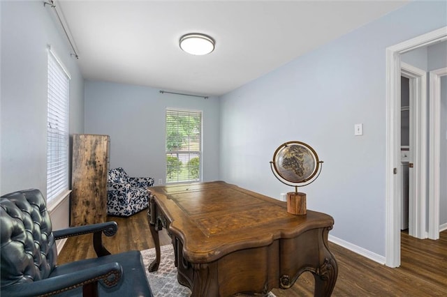 office area featuring wood finished floors and baseboards