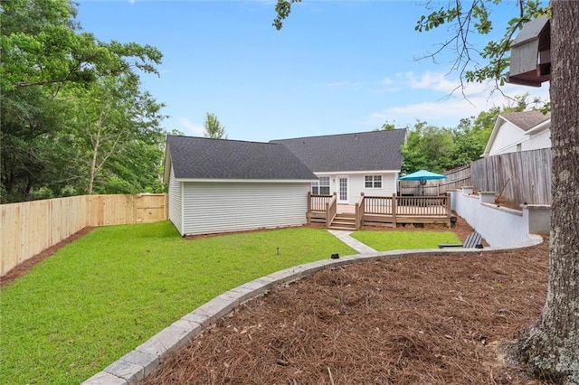 back of house with a wooden deck
