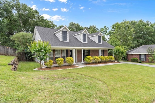 new england style home with brick siding and a shingled roof