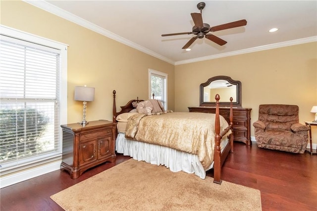 bedroom featuring crown molding, dark wood-type flooring, and ceiling fan