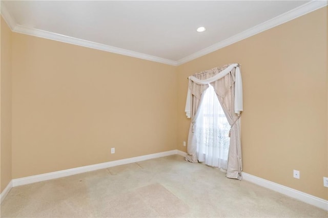 unfurnished room with ornamental molding, recessed lighting, light carpet, and baseboards