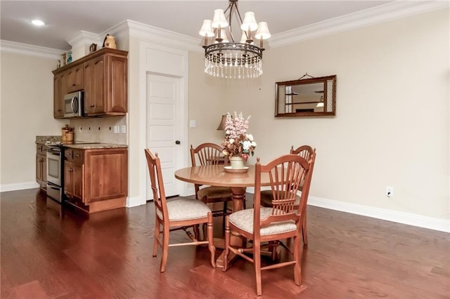 dining space featuring baseboards, dark wood finished floors, crown molding, a chandelier, and recessed lighting
