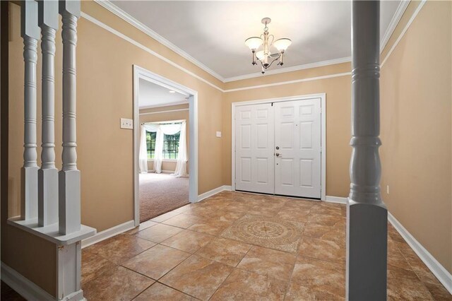 2000 Riverview Ave, Mobile, AL 36605 - foyer entrance with a chandelier, ornamental molding, and baseboards