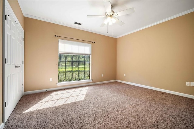 2000 Riverview Ave, Mobile, AL 36605 - carpeted empty room featuring ceiling fan, crown molding, and baseboards