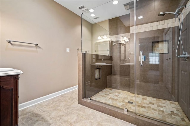 2000 Riverview Ave, Mobile, AL 36605 - full bath featuring vanity, baseboards, a shower stall, tile patterned floors, and recessed lighting