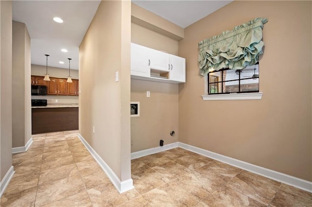 2000 Riverview Ave, Mobile, AL 36605 - laundry area with electric dryer hookup, hookup for a washing machine, baseboards, recessed lighting, and cabinet space