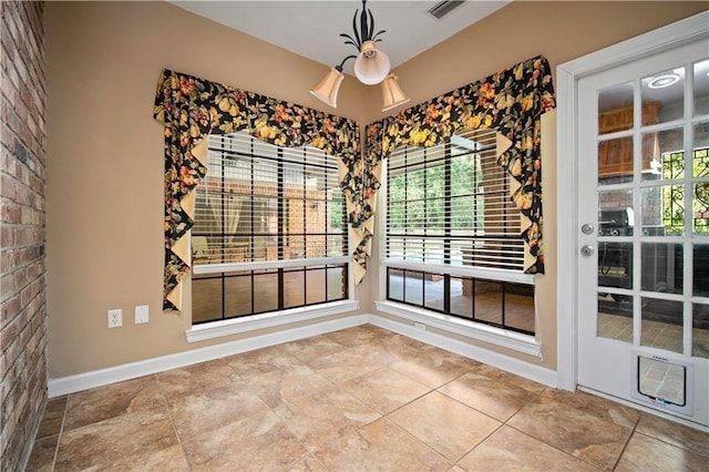 2000 Riverview Ave, Mobile, AL 36605 - unfurnished dining area with baseboards and healthy amount of natural light