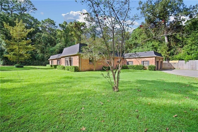 2000 Riverview Ave, Mobile, AL 36605 - view of front of property with concrete driveway, brick siding, and a garage