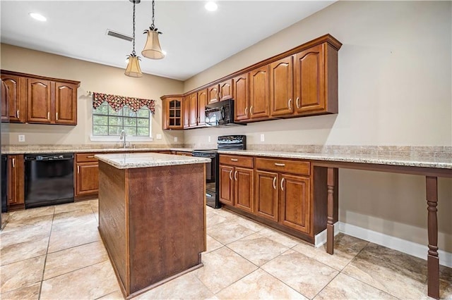 2000 Riverview Ave, Mobile, AL 36605 - kitchen with black appliances, a sink, brown cabinets, decorative light fixtures, and recessed lighting