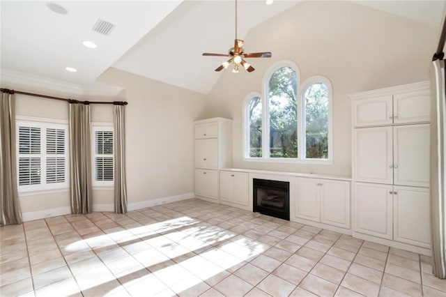 unfurnished living room featuring light tile patterned floors, visible vents, high vaulted ceiling, ceiling fan, and a glass covered fireplace