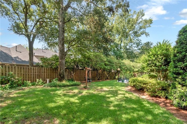 view of yard featuring fence