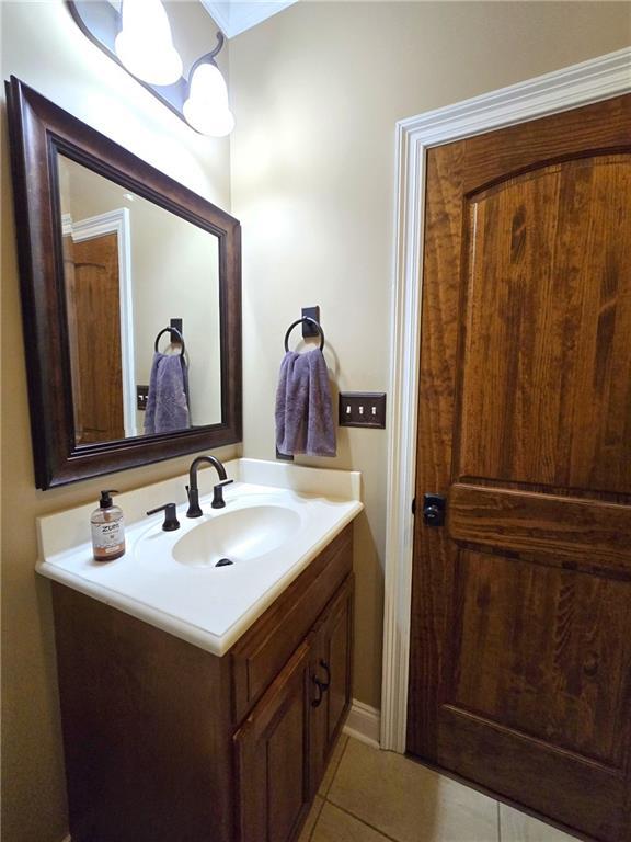 bathroom featuring vanity and tile patterned flooring