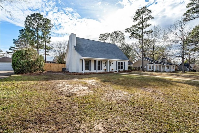 view of front of house featuring a front lawn and a porch