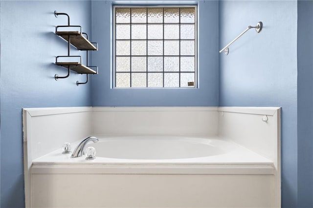 bathroom featuring a garden tub