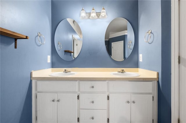 bathroom featuring double vanity and a sink