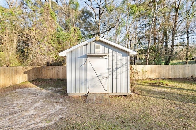 view of shed with a fenced backyard