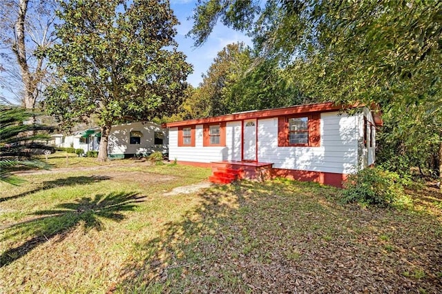 4054 Pringle Dr, Mobile, AL 36618 - ranch-style house featuring a front yard