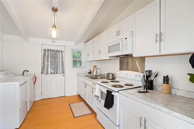 4054 Pringle Dr, Mobile, AL 36618 - kitchen featuring white appliances, separate washer and dryer, a sink, light wood-style flooring, and white cabinetry
