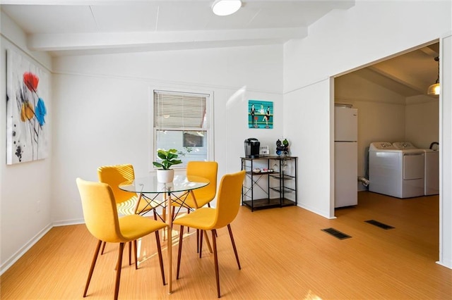 4054 Pringle Dr, Mobile, AL 36618 - dining room with washer / clothes dryer, light wood-style flooring, and baseboards