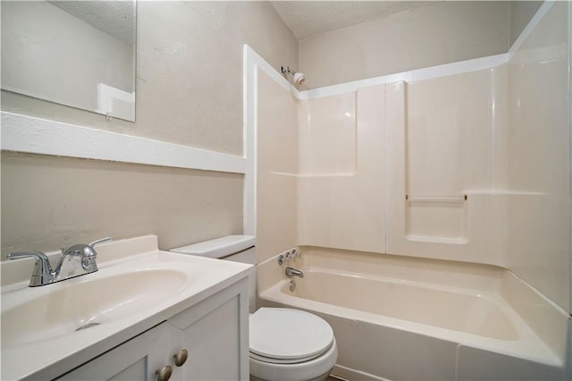 5015 Santos Dr W, Mobile, AL 36619 - bathroom featuring toilet, shower / tub combination, a textured ceiling, and vanity