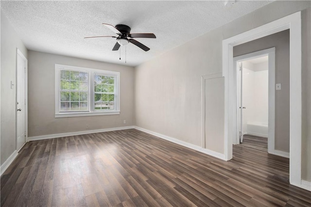 5015 Santos Dr W, Mobile, AL 36619 - empty room featuring a ceiling fan, dark wood-style flooring, a textured ceiling, and baseboards
