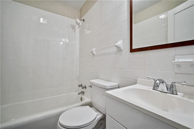 5015 Santos Dr W, Mobile, AL 36619 - full bath featuring tile walls, bathtub / shower combination, vanity, toilet, and tasteful backsplash