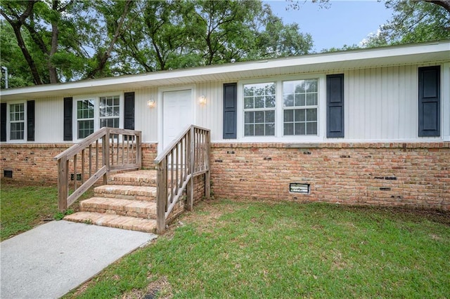 5015 Santos Dr W, Mobile, AL 36619 - single story home featuring brick siding, crawl space, and a front lawn