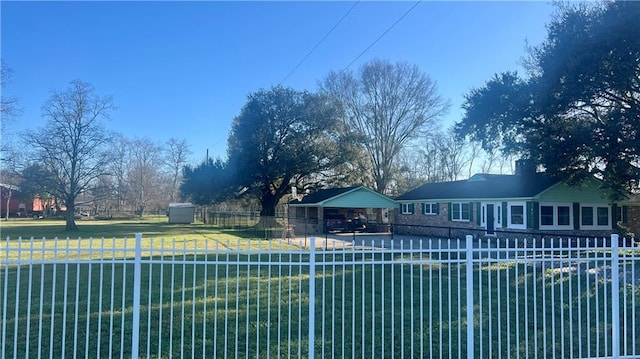 view of pool featuring fence, a lawn, and a gazebo