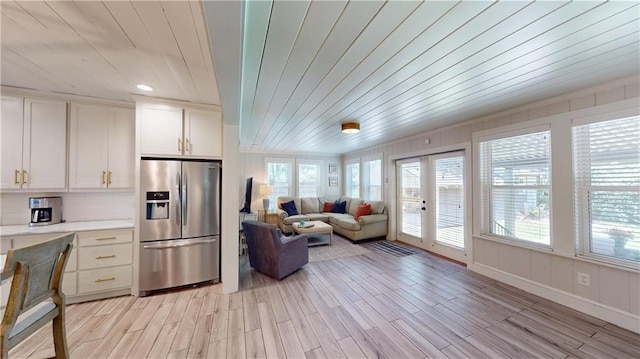 167 Glenwood St, Mobile, AL 36606 - living room with wooden ceiling and light wood-type flooring