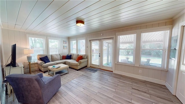 167 Glenwood St, Mobile, AL 36606 - living area with healthy amount of natural light, light wood-style floors, french doors, and wood ceiling