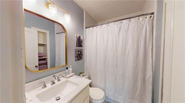167 Glenwood St, Mobile, AL 36606 - full bathroom with toilet, vanity, and a shower with shower curtain