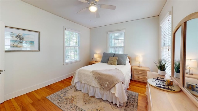 167 Glenwood St, Mobile, AL 36606 - bedroom featuring light wood-type flooring, baseboards, and ceiling fan