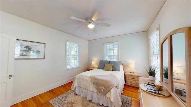 167 Glenwood St, Mobile, AL 36606 - bedroom with light wood-type flooring, baseboards, and a ceiling fan