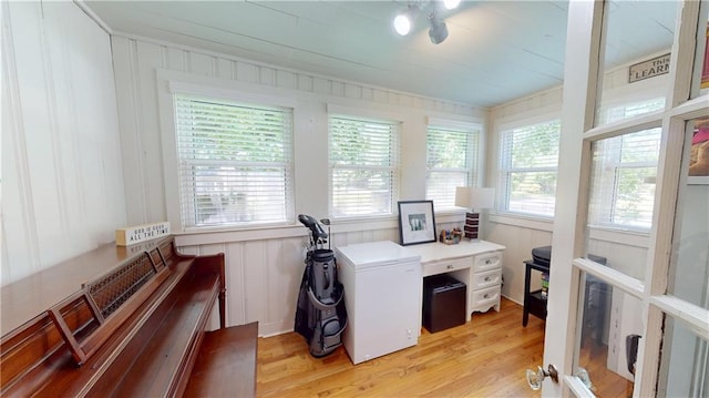 167 Glenwood St, Mobile, AL 36606 - office space featuring light wood finished floors, healthy amount of natural light, and a decorative wall