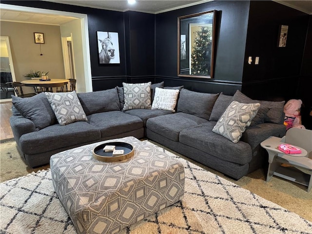 living room featuring carpet and ornamental molding