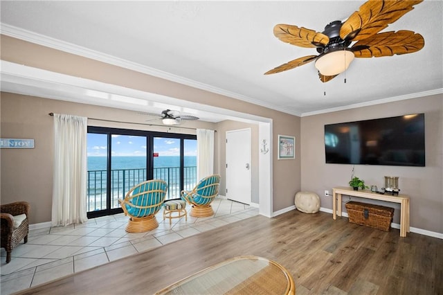 1051 Beach Blvd, Gulf Shores, AL 36542 - living room with ceiling fan, ornamental molding, and wood finished floors