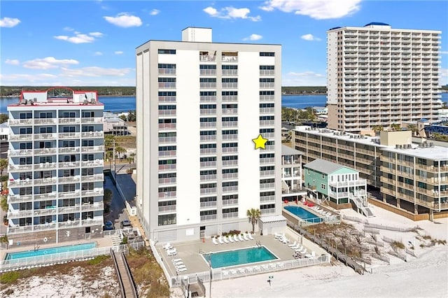 1051 Beach Blvd, Gulf Shores, AL 36542 - view of apartment building / complex featuring a water view