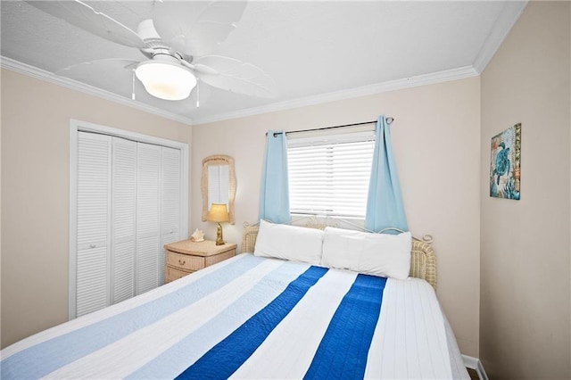 1051 Beach Blvd, Gulf Shores, AL 36542 - bedroom featuring a closet, ornamental molding, and a ceiling fan