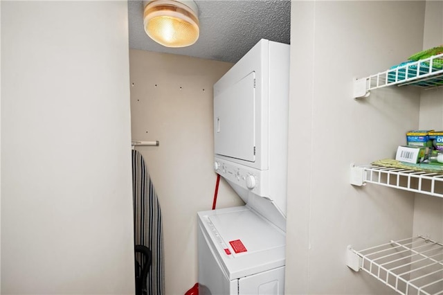 1051 Beach Blvd, Gulf Shores, AL 36542 - washroom with stacked washer / dryer